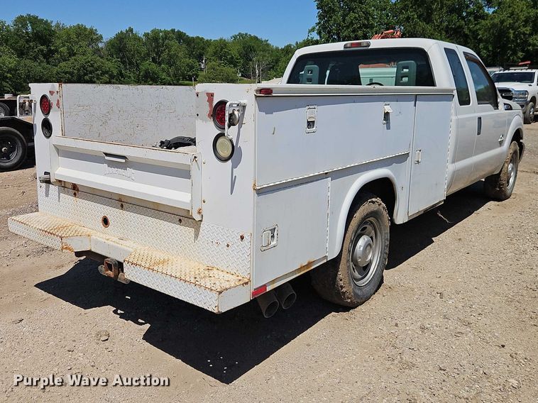 image for item EO7310 2011 Ford F350 Super Duty Ext. Cab utility bed pickup truck