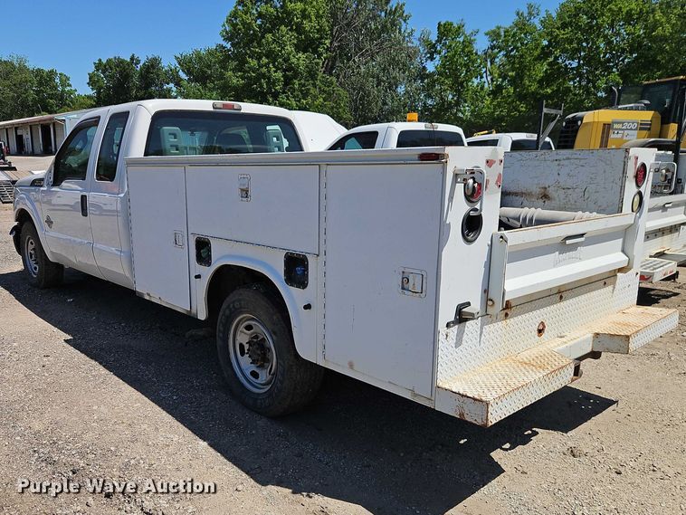 image for item EO7310 2011 Ford F350 Super Duty Ext. Cab utility bed pickup truck