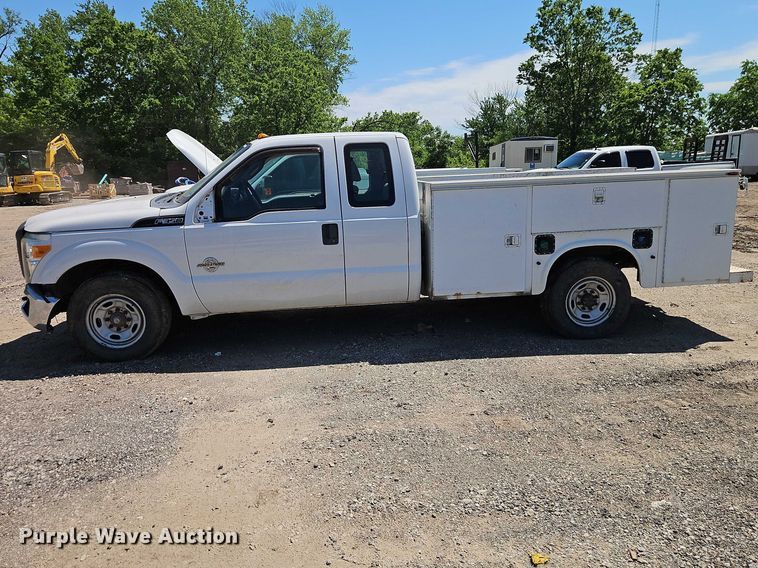 image for item EO7310 2011 Ford F350 Super Duty Ext. Cab utility bed pickup truck