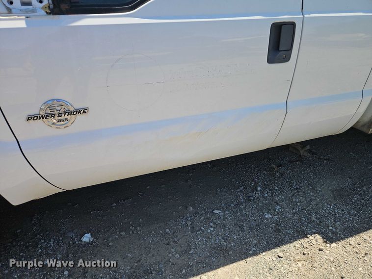 image for item EO7310 2011 Ford F350 Super Duty Ext. Cab utility bed pickup truck