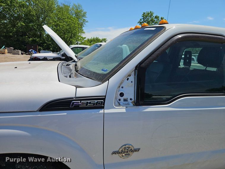 image for item EO7310 2011 Ford F350 Super Duty Ext. Cab utility bed pickup truck