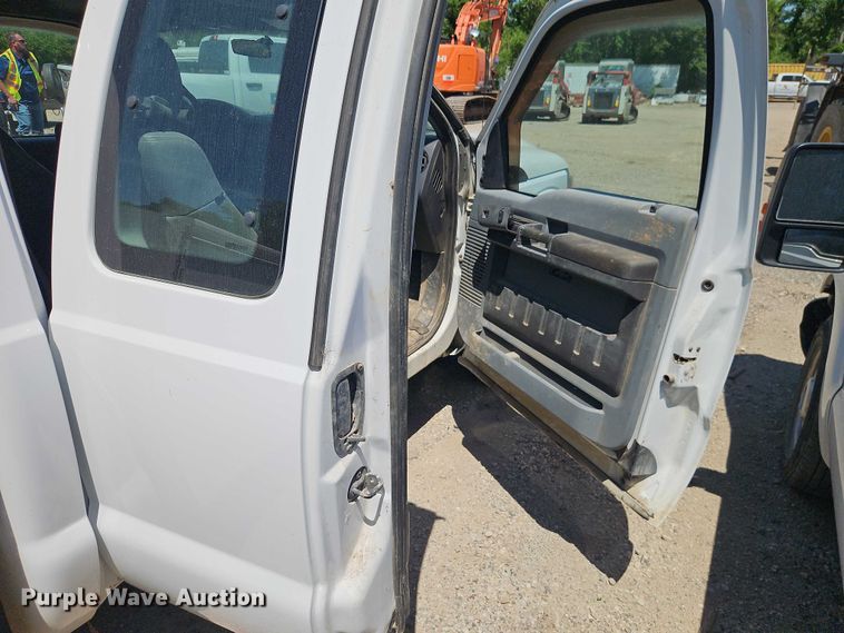 image for item EO7310 2011 Ford F350 Super Duty Ext. Cab utility bed pickup truck