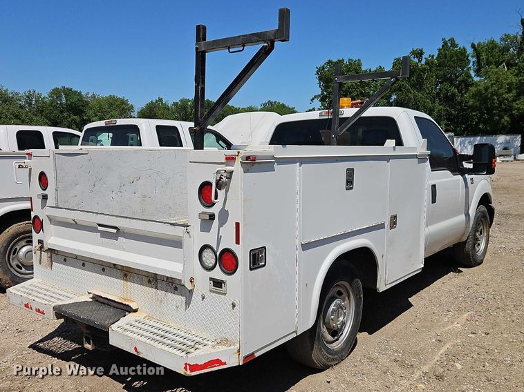 image for item EO7311 2014 Ford F350 Super Duty Ext. Cab utility bed pickup truck