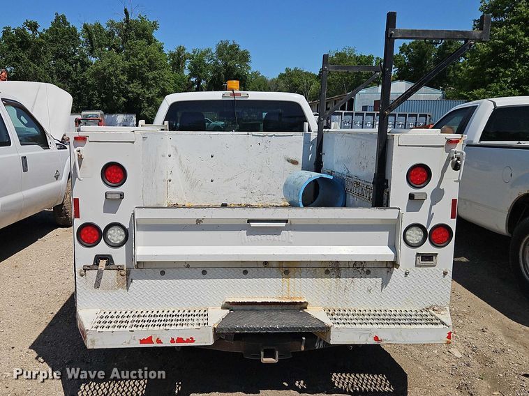 image for item EO7311 2014 Ford F350 Super Duty Ext. Cab utility bed pickup truck