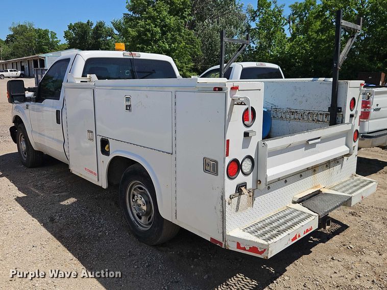 image for item EO7311 2014 Ford F350 Super Duty Ext. Cab utility bed pickup truck