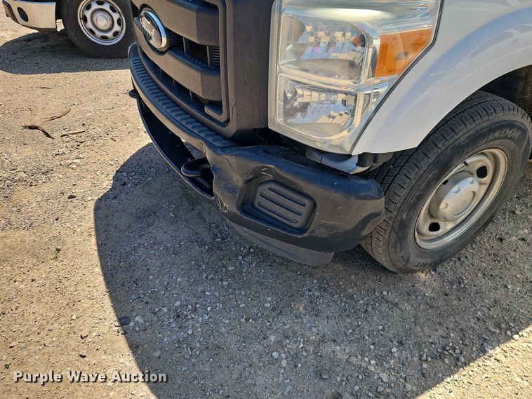 image for item EO7311 2014 Ford F350 Super Duty Ext. Cab utility bed pickup truck