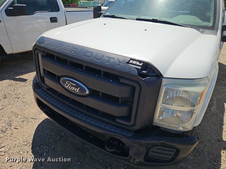 image for item EO7311 2014 Ford F350 Super Duty Ext. Cab utility bed pickup truck