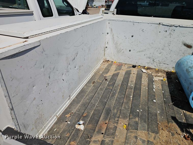 image for item EO7311 2014 Ford F350 Super Duty Ext. Cab utility bed pickup truck