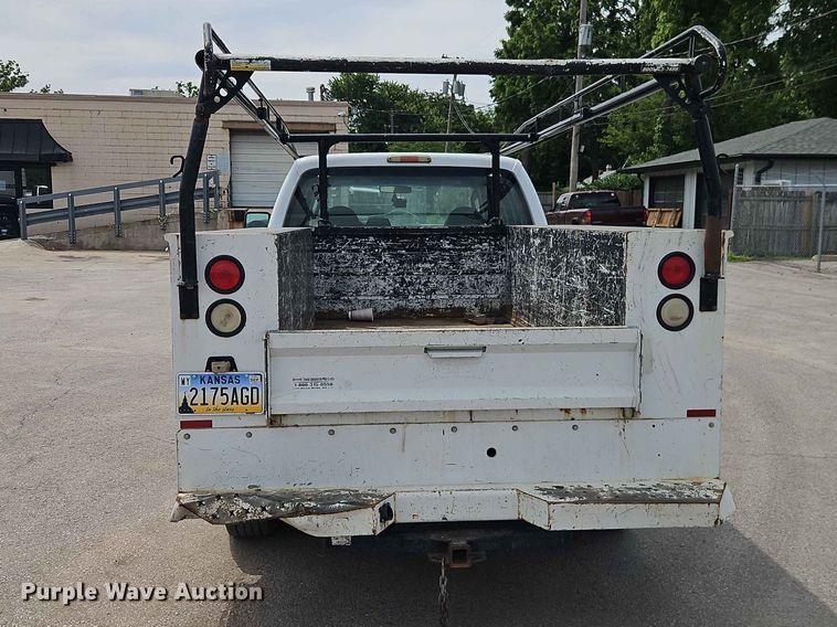 image for item EO7432 2009 Ford F250 Super Duty Crew Cab utility bed pickup truck