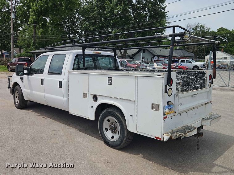 image for item EO7432 2009 Ford F250 Super Duty Crew Cab utility bed pickup truck