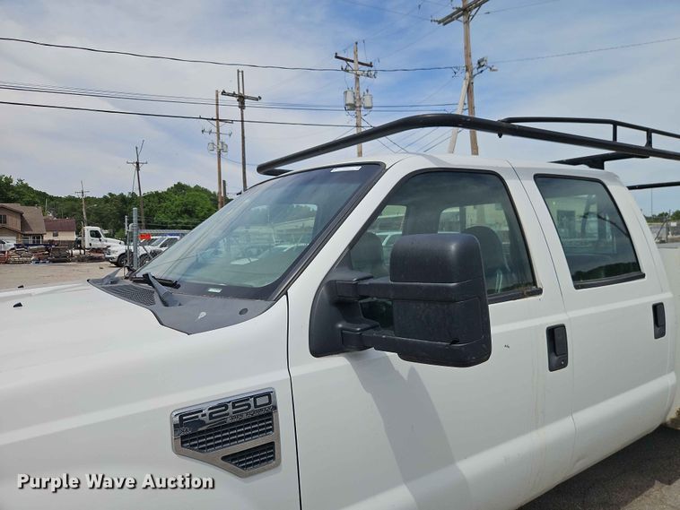 image for item EO7432 2009 Ford F250 Super Duty Crew Cab utility bed pickup truck