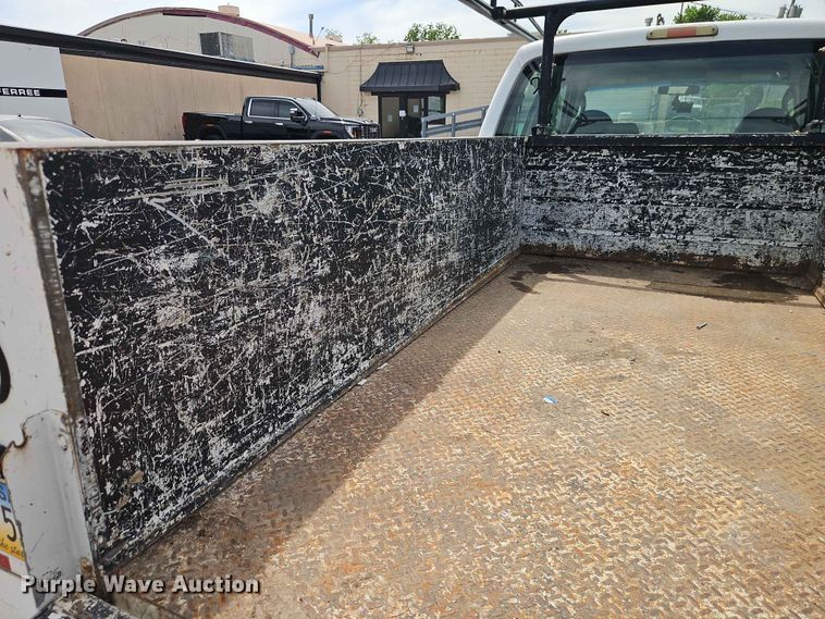 image for item EO7432 2009 Ford F250 Super Duty Crew Cab utility bed pickup truck