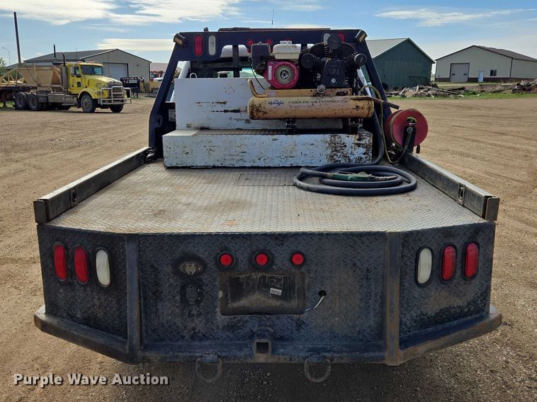 image for item ER1520 2011 Chevrolet Silverado 2500HD Crew Cab flatbed pickup truck