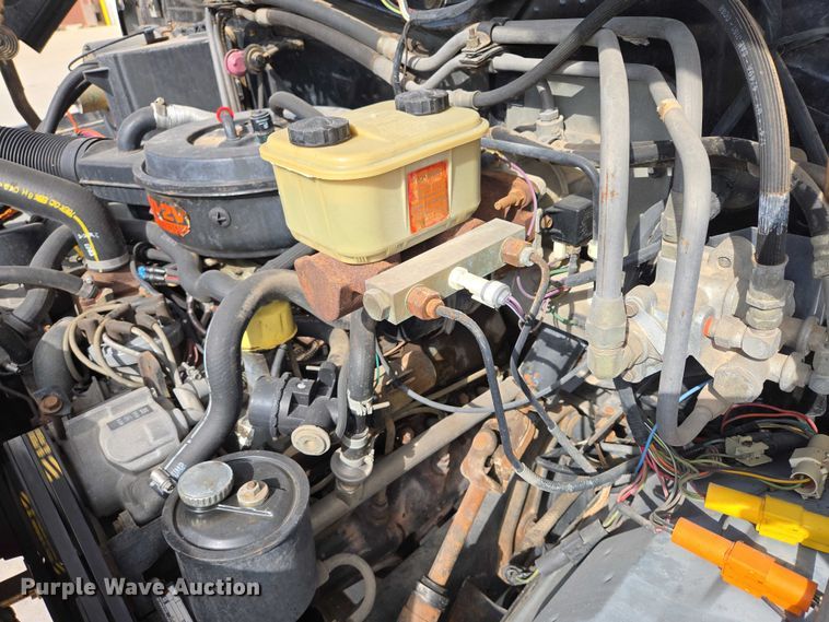 image for item ER1567 1989 Ford F600 flatbed truck