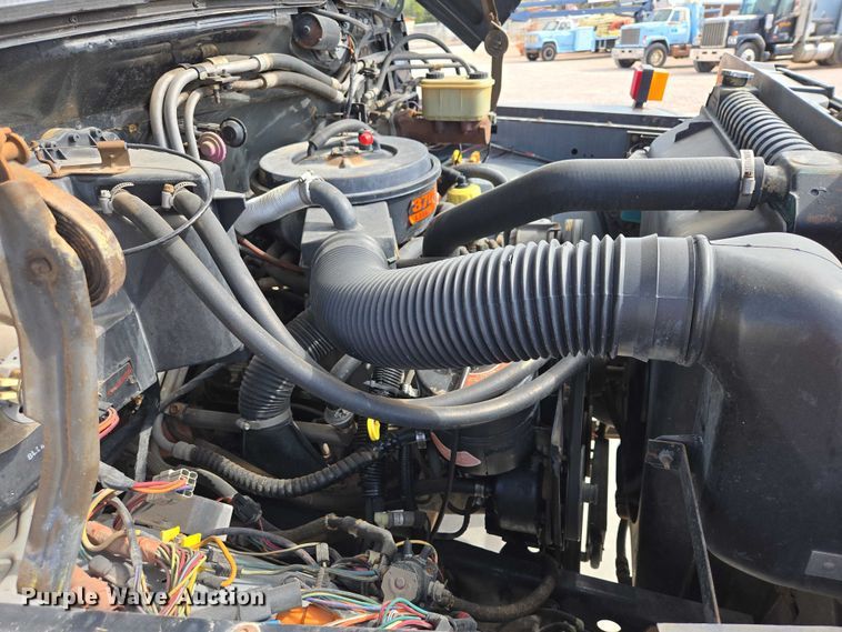 image for item ER1567 1989 Ford F600 flatbed truck