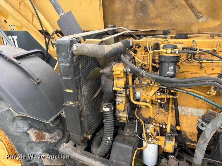 image for item ET2116 1998 Caterpillar TH103 telehandler