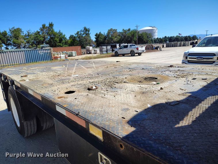 image for item EW1013 2003 Freightliner FL70 flatbed truck