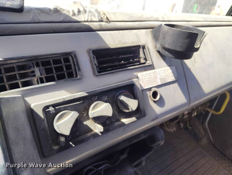image for item EW1013 2003 Freightliner FL70 flatbed truck
