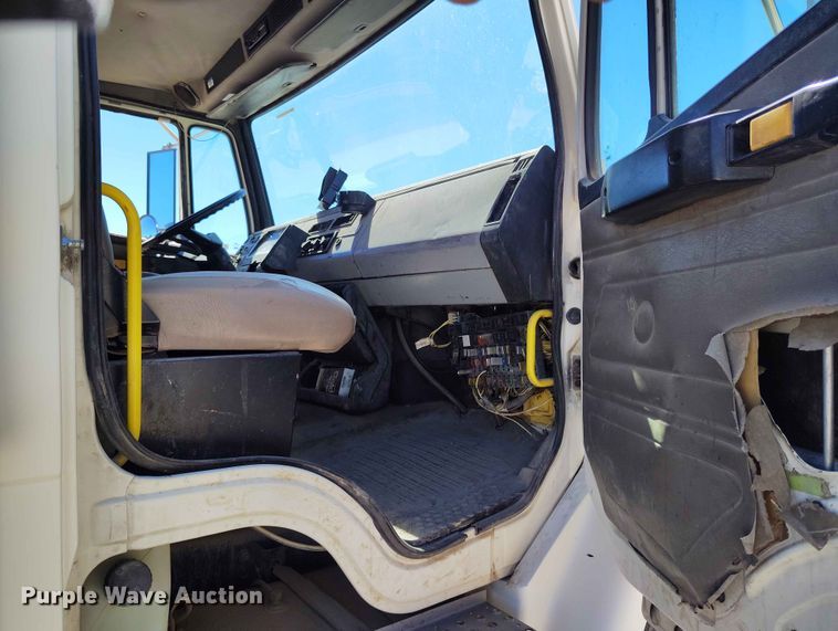 image for item EW1013 2003 Freightliner FL70 flatbed truck