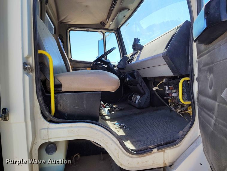 image for item EW1013 2003 Freightliner FL70 flatbed truck