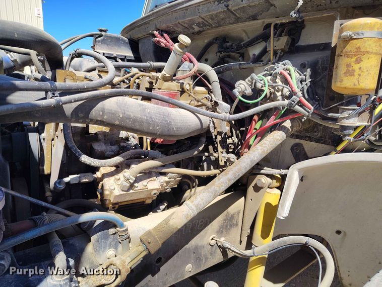 image for item EW1013 2003 Freightliner FL70 flatbed truck