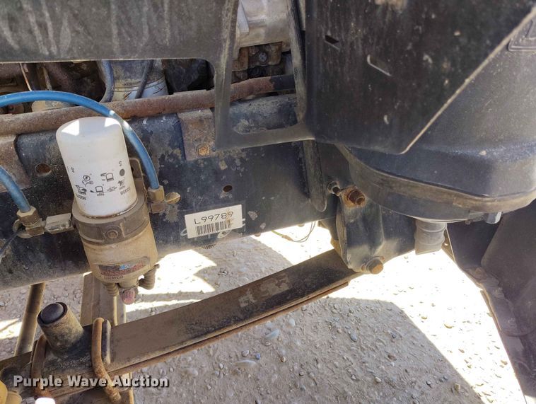image for item EW1013 2003 Freightliner FL70 flatbed truck