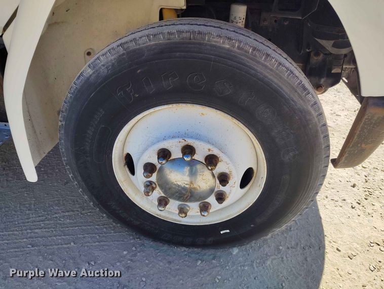 image for item EW1013 2003 Freightliner FL70 flatbed truck