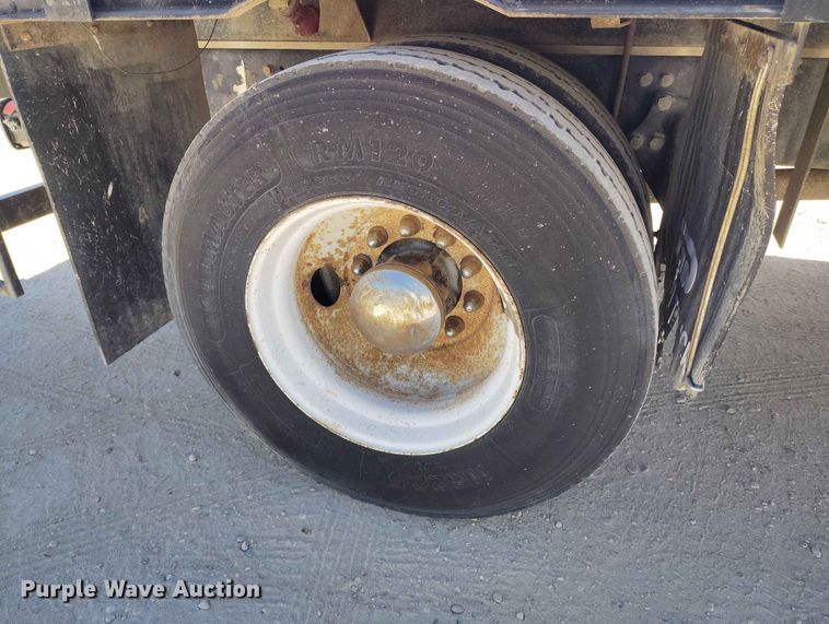 image for item EW1013 2003 Freightliner FL70 flatbed truck