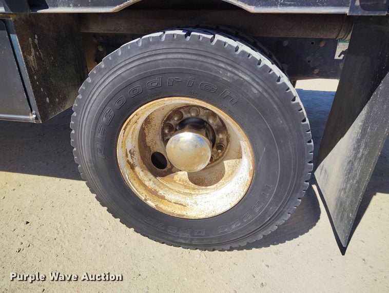 image for item EW1013 2003 Freightliner FL70 flatbed truck