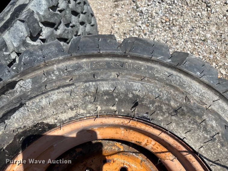 image for item FC5759 Skid steer wheels and tires