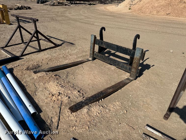 image for item EA4899 John Deere Worksite Pro backhoe forks