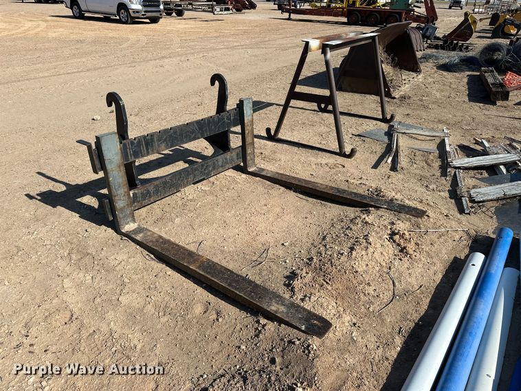 image for item EA4899 John Deere Worksite Pro backhoe forks
