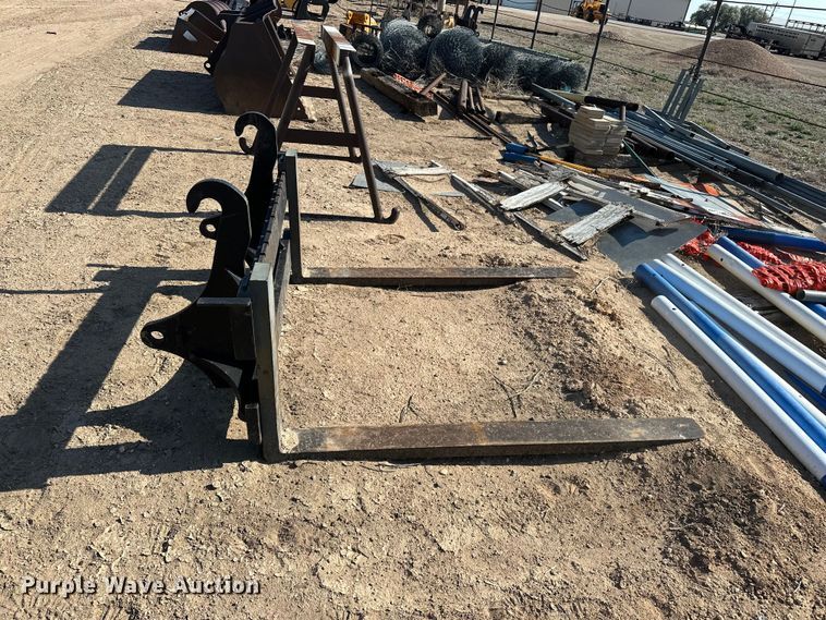 image for item EA4899 John Deere Worksite Pro backhoe forks