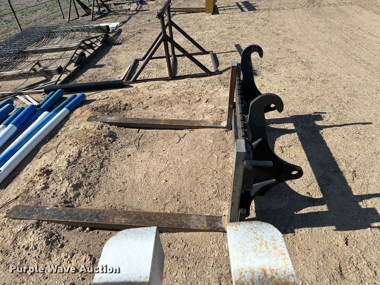image for item EA4899 John Deere Worksite Pro backhoe forks