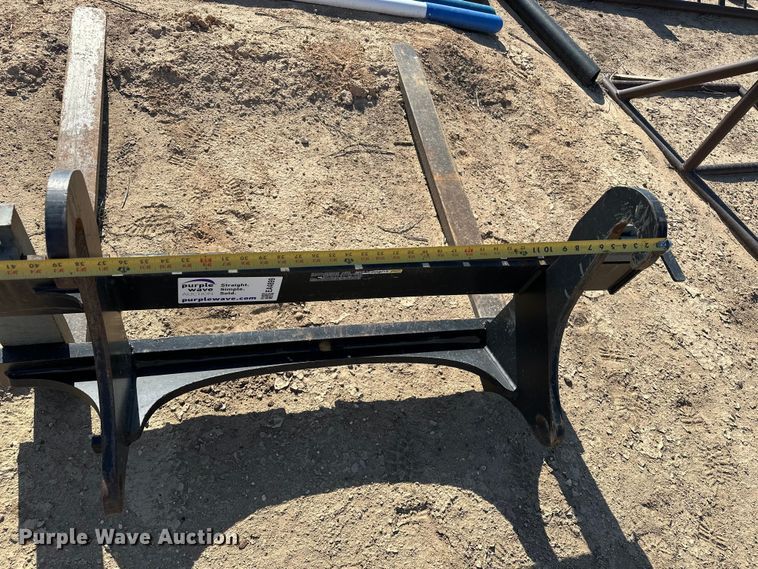 image for item EA4899 John Deere Worksite Pro backhoe forks