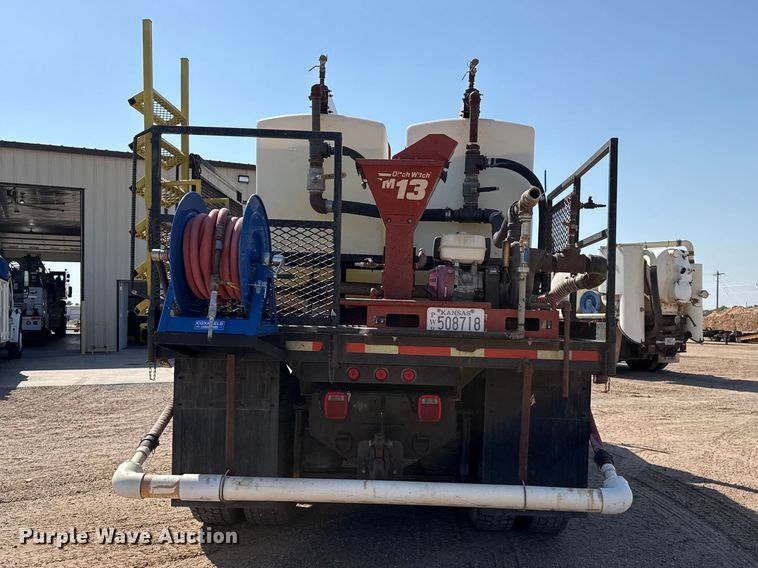 image for item GP9703 1997 Mack CH613 flatbed truck with mud mixing system