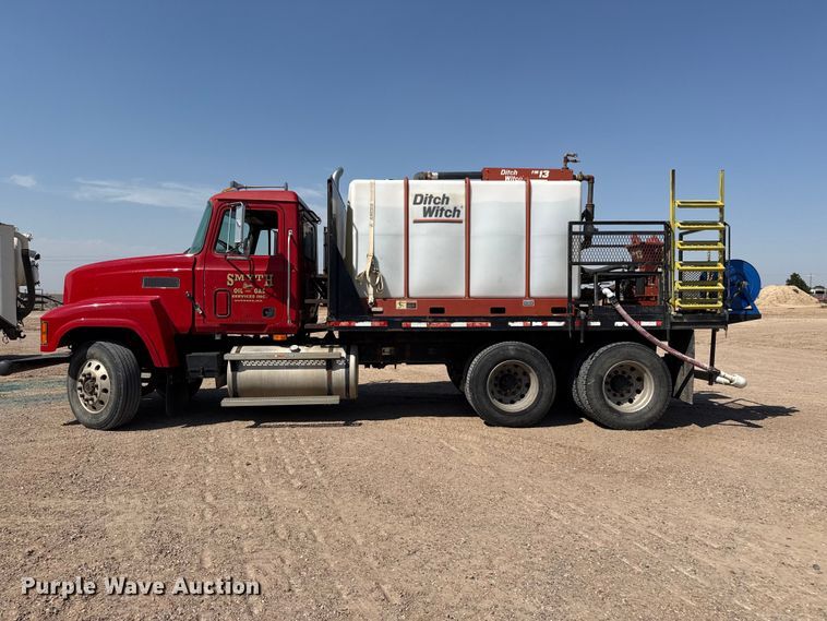 image for item GP9703 1997 Mack CH613 flatbed truck with mud mixing system