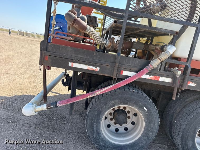 image for item GP9703 1997 Mack CH613 flatbed truck with mud mixing system
