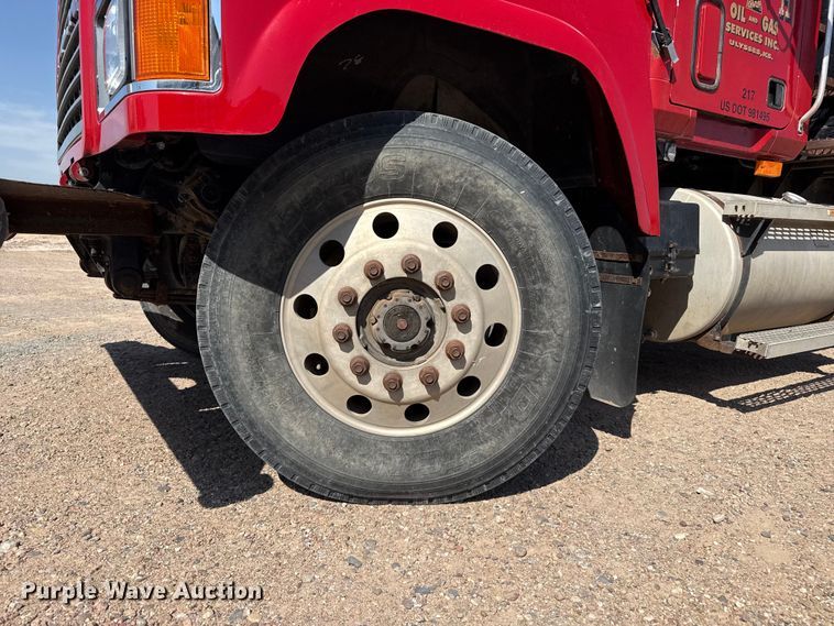 image for item GP9703 1997 Mack CH613 flatbed truck with mud mixing system