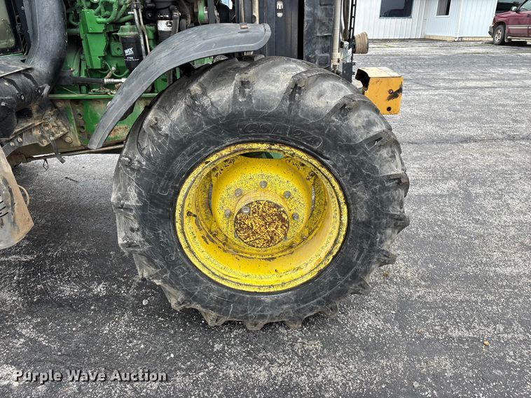 image for item EO4314 2013 John Deere 6115M MFWD tractor