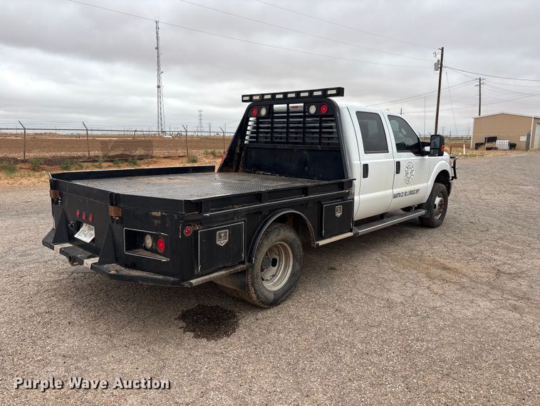 image for item FC2223 2014 Ford F350 Super Duty Crew Cab flatbed pickup truck