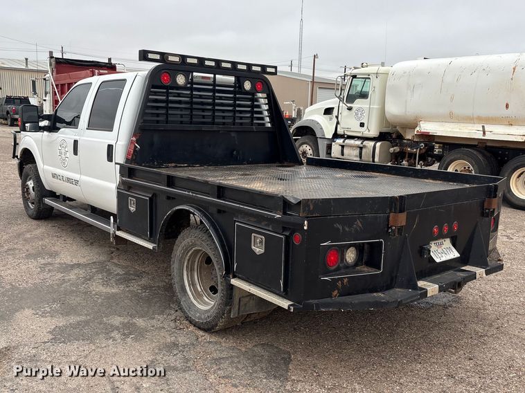image for item FC2223 2014 Ford F350 Super Duty Crew Cab flatbed pickup truck