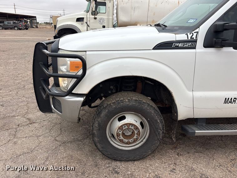 image for item FC2223 2014 Ford F350 Super Duty Crew Cab flatbed pickup truck