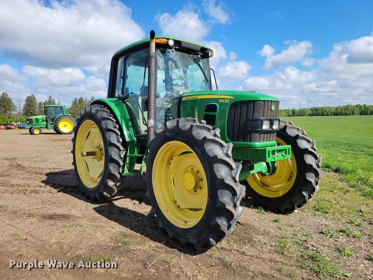image for item DZ7154 2011 John Deere  6430 MFWD tractor