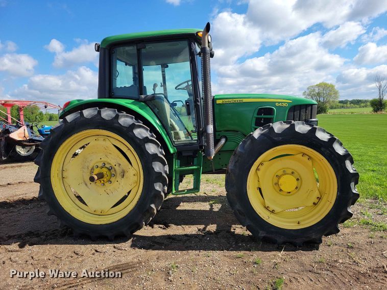 image for item DZ7154 2011 John Deere  6430 MFWD tractor