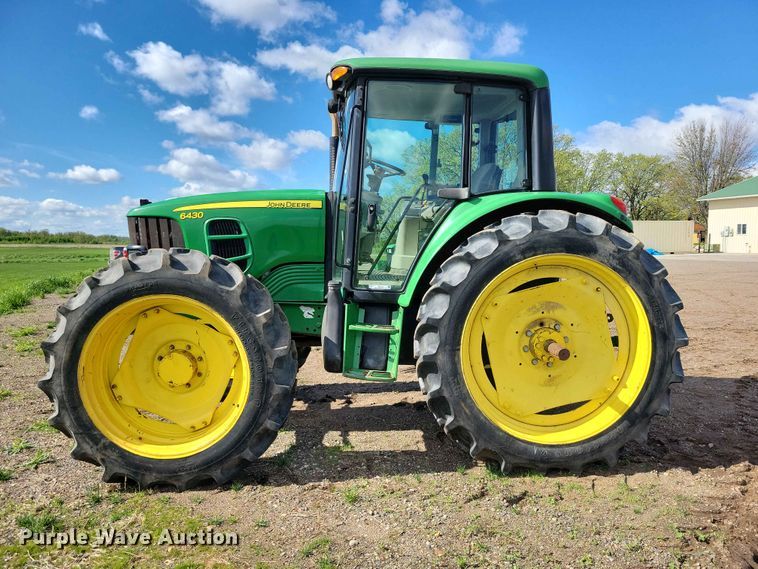 image for item DZ7154 2011 John Deere  6430 MFWD tractor