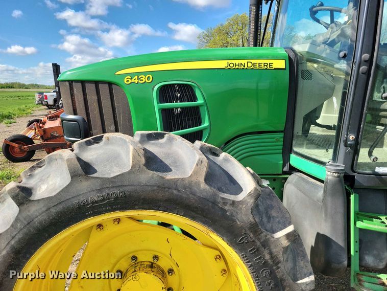 image for item DZ7154 2011 John Deere  6430 MFWD tractor