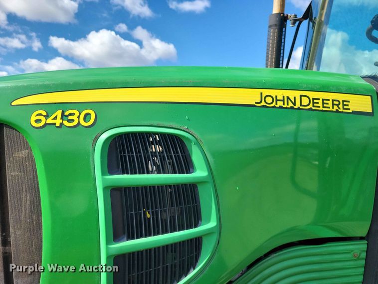 image for item DZ7154 2011 John Deere  6430 MFWD tractor