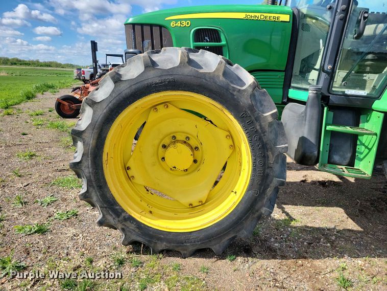 image for item DZ7154 2011 John Deere  6430 MFWD tractor