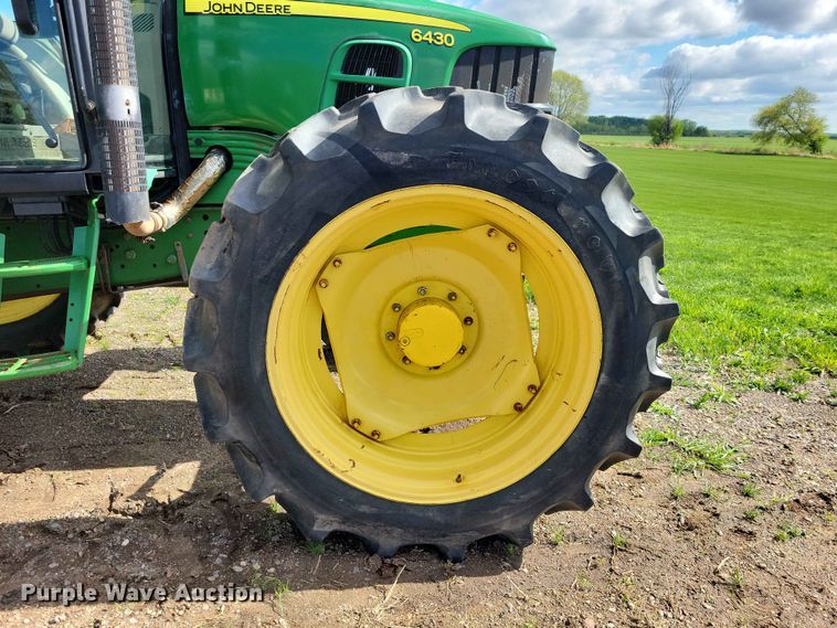 image for item DZ7154 2011 John Deere  6430 MFWD tractor